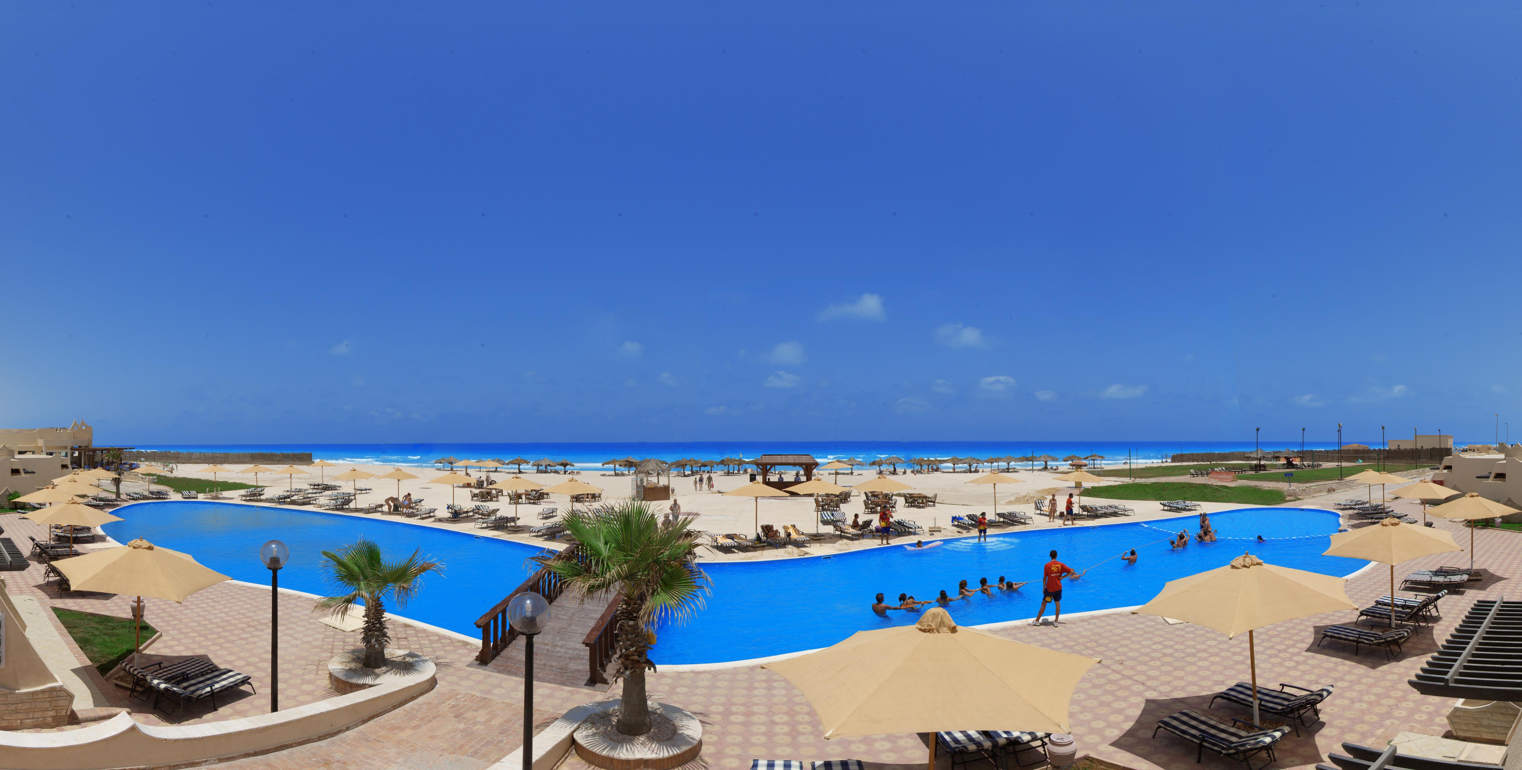 Borg El Arab Beach Resort Kültér fotó The beach at the resort